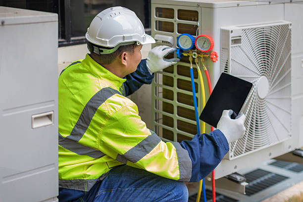 Professional Air Duct Cleaning technician working in La Fontaine, IN